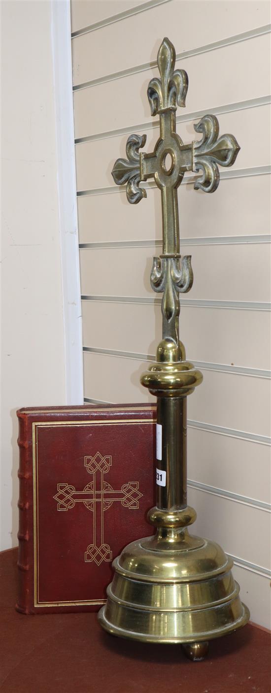 A leather bound altar Missale Romanum and a bronze crucifix height 87cm